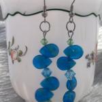 Turquoise Glass Beads And Green Swarovski Crystal..
