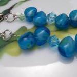 Turquoise Glass Beads And Green Swarovski Crystal..